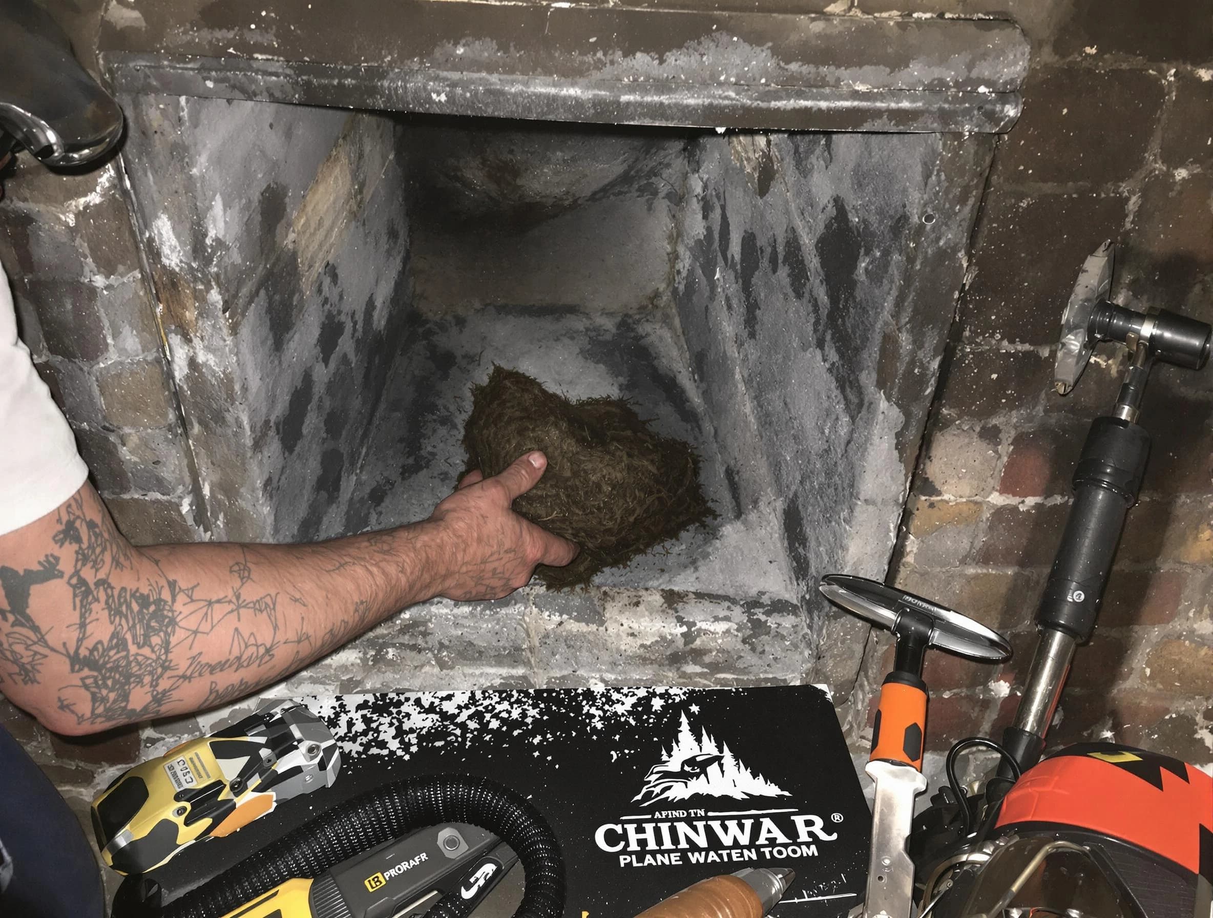 Leominster Chimney Sweep safely removing debris and screening chimney in Leominster, MA